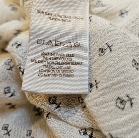 Free People | Cream Colored Tunic with Ancient Runes Pattern - Picture 9 of 9